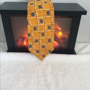 A orange and blue tie by perry Ellis